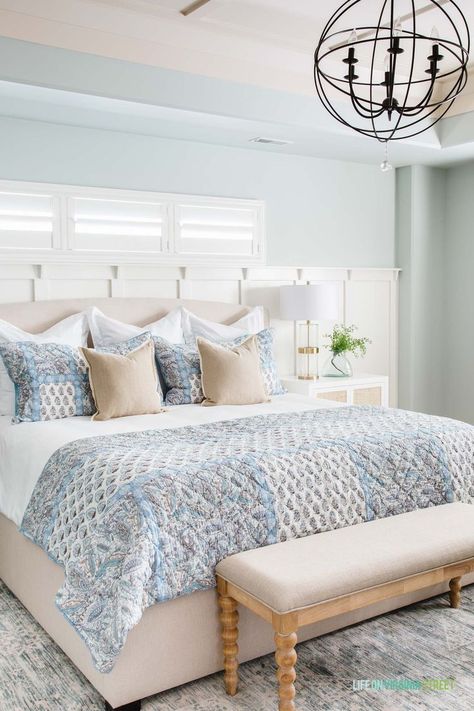 Loving this beautiful master bedroom with blue, tan, and white bedding! The neutral master bedroom colors make it feel so relaxed! #masterbedroom #bedroomdecor #bedroommakeover Georgia Apartment, Mom Room, Bedding Neutral, Batten Board, Bedroom Upstairs, Paisley Bedding, Blue Interiors, Sphere Light, Blue Bed