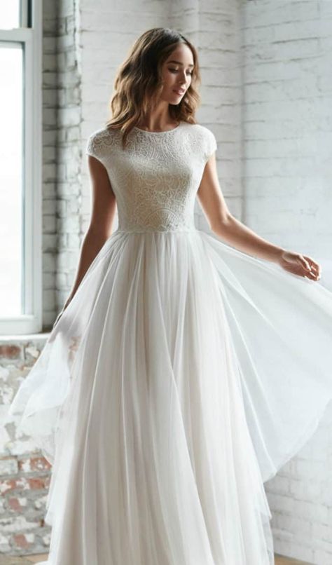 Gorgeous lace cap sleeve and tulle wedding dress under $2000 | Riva by Ti Adora Fall 2018 #weddings #weddingdress #bridal #bridalgowns #capsleeveweddingdress Honeymoon Dress, Modern Bridal Gowns, Bridal Gown Styles, Wedding Dress Cap Sleeves, Dresses Indian, Evening Dresses For Weddings, Natural Wedding, Sleeve Wedding Dress, Fall Wedding Dresses