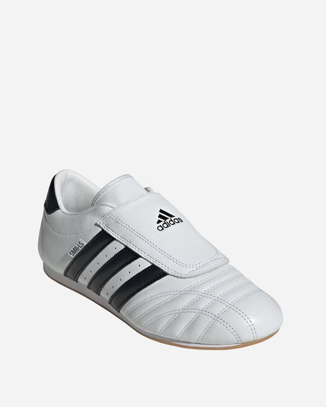 These Taekwondo shoes from adidas pay homage to the early 00s with a minimalist slip-on design deeply rooted in the history of the martial art. Crafted from soft leather, they hug your foot in streamlined comfort, while the super-low rubber outsole provides flexible traction. They're an instant everyday classic, while their unique forefoot stitching, distinctive 3-Stripes and laces give them an identity all their own. Taekwondo Shoes, Sports Accessories, Sneaker Brands, Eyewear Accessories, White Adidas, Taekwondo, Shoe Care, Lifestyle Brands, Adidas Shoes