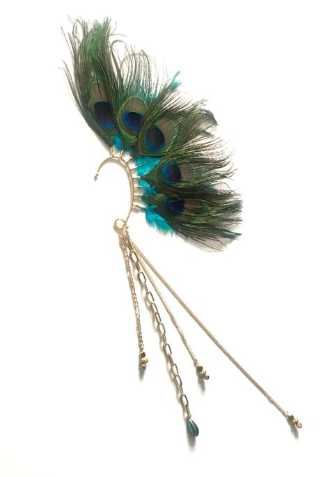 Peacock feather ear cuff, statement ear cuff, statement jewelry, feather and chain ear cuff, party jewelry Feather Ear Cuff, Leather Jewelry Making, Leather Jewellery, Wrap Earrings, Peacock Feathers, Feb 7, Peacock Feather, Party Jewelry, Cuff Earrings