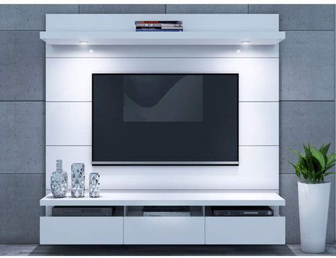 Wade Logan Julius Entertainment Center for TVs up to 65" #shopping #deals #homedecor Floating Entertainment Center, Tv Unit Furniture Design, Modern Tv Wall Units, Tv Unit Furniture, Tv Cabinet Design, Tv Unit Interior Design, Modern Tv Wall, Wall Tv Unit Design, Living Room Tv Unit Designs