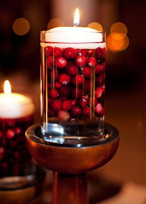 glass with cranberries and a floating candle is a simple centerpiece Thanksgiving Tips, Host Thanksgiving, Cranberry Candles, Non Floral Centerpieces, Floating Candle Centerpieces, Winter Bridal Showers, Floating Candle, Diy Thanksgiving, Fall Wedding Centerpieces