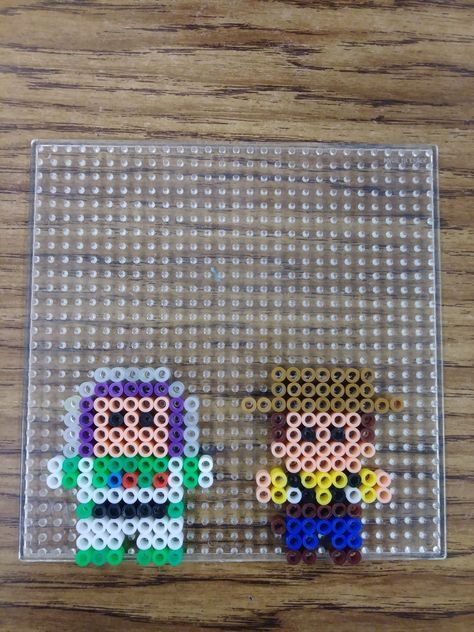 Woody and Buzz fuse bead pattern (small or large square board) Small Disney Perler Beads, Small Bead Art, Fuse Bead Patterns Disney, Perler Bead Patterns Square Board, Disney Fuse Beads, Small Square Perler Bead Patterns, Perler Bead Small Patterns, Small Fuse Bead Ideas, Perler Bead Patterns Small Easy