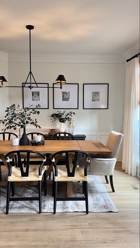 I spent months looking for the perfect dining table and this one does not disappoint! Its extendable up to 102inch with 8 chairs fitting comfortably! Looks modern and sleek! #modernfarmhousestyle #diningroomideas #diningtablewithchairs #diningtabledecor #diningroomtable #diningroomdecorideas #modernfarmhousedecor Wishbone Chair Dining Room, Wishbone Dining Chairs, Neutral Dining Room Decor, Dining Room Arrangement, Modern Farmhouse Dining Table, Japandi Home Decor, Dining Room Area Rug, Neutral Dining Room, Dining Room Area