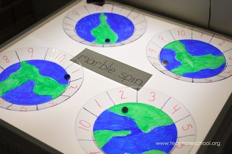 We put a little spin into our Earth Day planning with this around the world marble game. I had a set of clear plates left over from a recent family gathering and thought they would be great for the light table. All I needed to do was to figure out what we could do with them. So I … Preschool Travel, Camping Preschool, Camping Theme Preschool, Around The World Theme, Day Planning, Teach Preschool, Clear Plates, Earth Book, Marble Games