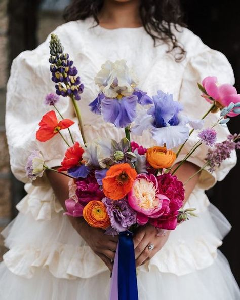 The Florist Quarter on Instagram: "Queen of making us swoon @lottiephillips.florist 🤩 This bouquet literally has it all - peonies, poppies, lupins, 'nuncs and those perfect beaded iris. It's too much!! Not to mention that dress 😍 📷 @ninahamiltonphotography @lottiephillips.florist @laila_keliani @blossflowerfarm #thefloristquarter #lottiephillips #lottiephillipsflorist #tasmanianflorist #hobartflorist #hobartweddingflowers #tasmanianflowers #tassieweddings #tasmanaianweddings #australianfl Lupins Bouquet, Iris Wedding Bouquet, Iris Wedding, Iris Bouquet, Instagram Queen, That Dress, Bright Pastels, Flower Arrangement, Wedding Bouquet