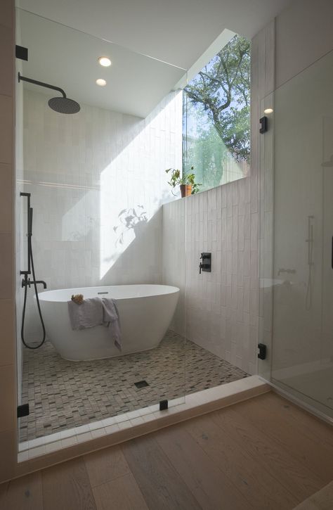 Dwell - This Slick Austin Home Offered at $1.95M Stretches Like an Accordion Modernist Bathroom, Japanese Soaking Tub Shower Combo, Shower Tile Combinations, Shower Tile Design, Soaking Tub Shower Combo, Green Bathrooms, Tile Combinations, Dark Green Bathrooms, Japanese Bathroom