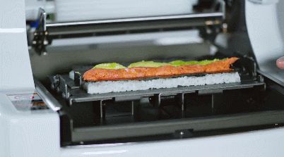 AUTEC Maki Sushi Robot Produces 450 Rolls an Hour Sushi Machine, Maki Sushi, A Robot, Food Stuff, Griddle Pan, Food Preparation, Rolls, Tools