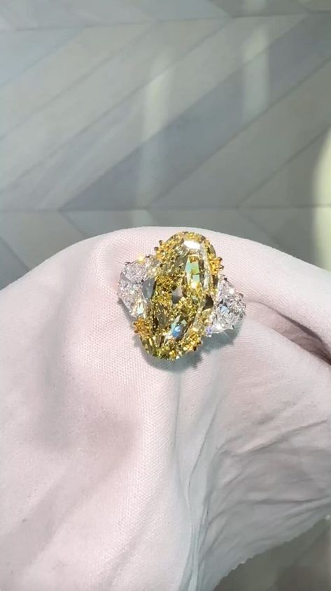 Oval Yellow  diamond ring, 3 stone engagement ring, 12 carats oval cut fancy  diamond ring, pastel yellow ring, yellow diamond promise ring Welcome To My Shop, Great to Know You All Here. 💍 𝐑𝐢𝐧𝐠 𝐃𝐞𝐭𝐚𝐢𝐥𝐬  🔹 𝐌𝐞𝐭𝐚𝐥 𝐎𝐩𝐭𝐢𝐨𝐧𝐬:925 Sterling Silver 10 Carat/14 Carat/18 Carat Gold (Can be made in yellow/rose/white gold) 🔹 𝐒𝐭𝐨𝐧𝐞 𝐂𝐡𝐨𝐢𝐜𝐞: Moissanite  🔹 𝐒𝐭𝐨𝐧𝐞 𝐒𝐡𝐚𝐩𝐞: oval 🔹 𝐒𝐭𝐨𝐧𝐞 𝐒𝐢𝐳𝐞: 8 CT 🔹 𝐁𝐚𝐧𝐝 𝐒𝐡𝐚𝐧𝐤 𝐏𝐫𝐨𝐟𝐢𝐥𝐞: Designer  🔹 𝐁𝐚𝐧𝐝 𝐖 Canary Diamond Ring, Ring Yellow Diamond, Three Diamond Ring, Ring 3 Stone, Fancy Diamond Ring, 3 Stone Engagement Ring, Yellow Diamond Ring, Canary Diamond, Yellow Ring