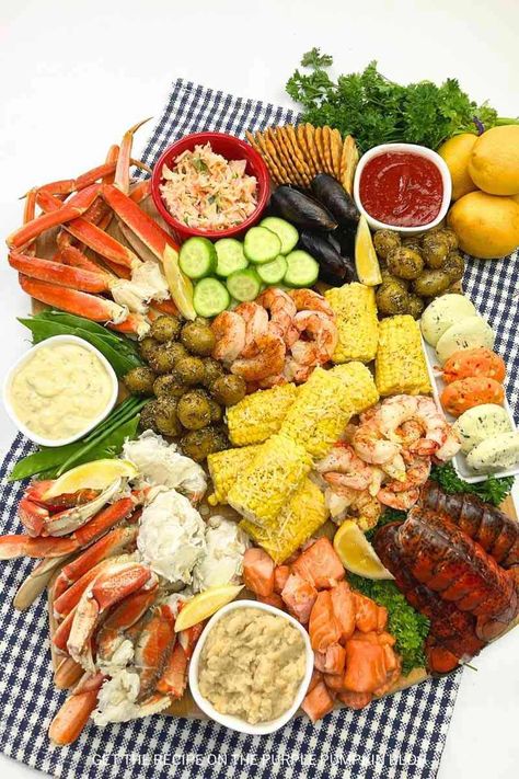 Experience a seafood extravaganza like no other with our irresistible Seafood Charcuterie Board. Indulge in the richness of lobster tails, crab legs, shrimp, and more. Accompanied by vibrant vegetables, scrumptious sauces, and delightful extras. Explore the recipe on The Purple Pumpkin Blog and #SeafoodCharcuterieCrush. Seafood Grazing Board, Charcuterie Board With Shrimp Cocktail, Seafood Platter Photography, Fried Seafood Platter, Mini Apple Tarts, Tiered Seafood Platter, Pecan Pie Bites, Maple Fudge, Cranberry Bars