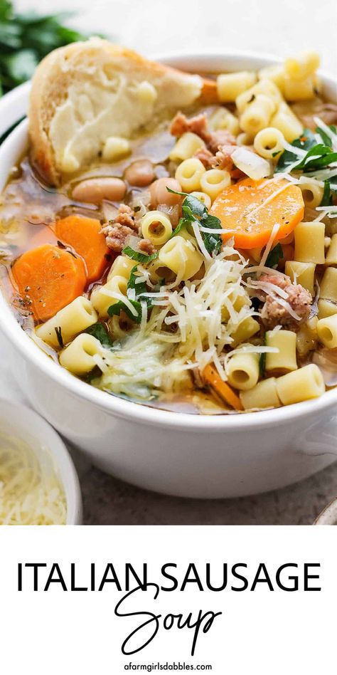 This Italian Sausage Soup recipe features an herby white wine-infused broth loaded with Italian-flavored chicken sausage, creamy white beans, tender ditalini pasta, and fresh carrots. It's a hearty-yet-light, family-pleasing, comfort food meal! Pork Sausage Soup, Flavored Chicken, Italian Chicken Pasta, Sausage Crockpot, White Bean Recipes, Sausage Soup Recipes, Fresh Carrots, Italian Chicken Sausage, Italian Sausage Pasta