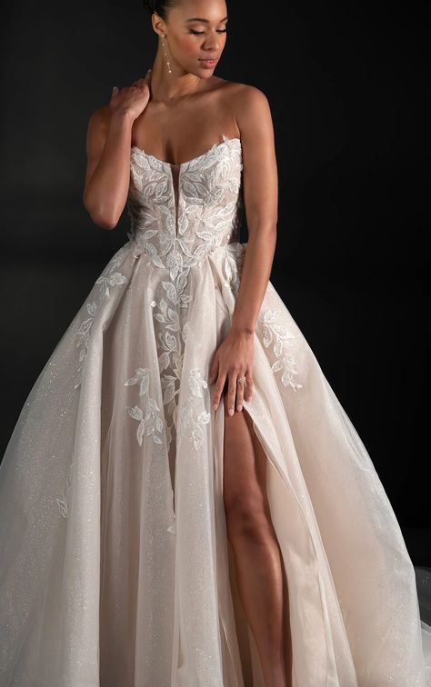 Enchanting strapless lace wedding dress with 3D floral accents, glitter tulle, and a romantic flowing train. Available with lined or sheer skirt options. Romantic A Line Wedding Dress Tulle, A Line Tulle Wedding Dress, Drop Waist Gown, Strapless Lace Wedding Dress, Martina Liana Wedding Dress, Plan Checklist, Beautiful Ball Gowns, Couture Bridal Gowns, Wedding Dress Store