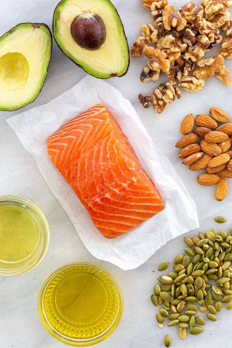 We hear a lot about fat these days. Some fat is good, some fat is bad (looking at you, trans fat). So what’s what when it comes to fats — and why? #health #fats #hearthealth Simple Baked Salmon, Regulating Hormones, Healthy Sport, Cholesterol Lowering Foods, Unsaturated Fats, Carb Cycling, Baked Salmon Recipes, Fat Foods, Healthy Brain