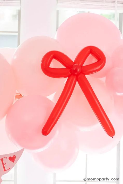 Experience love with a twist at our Bow-Themed Valentine's Day Party. With a blend of modern design and all things red and pink, this celebration is sure to make your heart go bow! From chic balloon decoration to heart/love inspired tableware, we've got ideas for an unforgettable Valentine's Day or Galentine's Day celebration. Check out momoparty.com for more party ideas. Red And Pink Party Decorations, White Cutlery, Honeycomb Heart, Balloon Cloud, Valentines Birthday Party, Bow Party, Winter Birthday Parties, Balloon Clouds, 5 Balloons