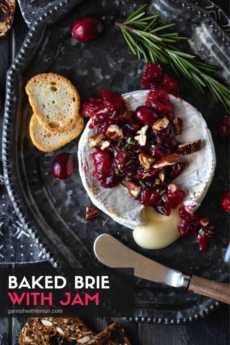 Nothing screams party like warm, melty cheese! This elegant Baked Brie with Jam recipe has a homemade cranberry compote that is both seasonal and seriously tasty. Plus it can be made in 15 minutes - the perfect holiday appetizer! Baked Brie With Cranberries, Brie With Cranberries, Easy Baked Brie Recipe, Baked Brie With Jam, Brie Recipes Appetizers, Baked Brie Recipe, Baked Brie Appetizer, Baked Brie Recipes, Brie Appetizer