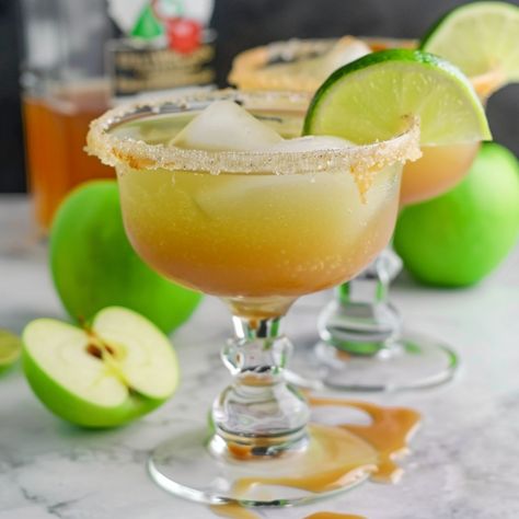 Caramel Apple Margarita Caramel Apple Cider Margarita, Caramel Apple Margarita, Green Apple Cocktails, Caramel Apple Suckers, Apple Margarita, Sour Apple Pucker, Apple Pucker, Apple Cocktail, Cocktail Drinks Alcoholic