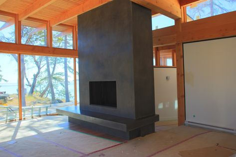 Tadelakt Fireplace, Stucco Fireplace Ideas, Venetian Plaster Fireplace, Black Stucco, Plaster Fireplace, Wood Burning Cook Stove, Sleek Fireplace, Stucco Fireplace, Tall Fireplace