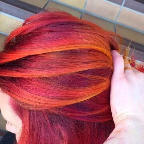 Pravana Vivids Mix. Hairstylist Guy Tang created this incredible blend by using Pravana Vivids Neon Orange Yellow, Orange, Magenta, Red, and Wild Orchid. To recreate this look, try using Magenta and Wild Orchid on the roots, Red on the mids and lower layers, and Neon Orange Yellow and Orange on ends! Cheveux Oranges, Sunset Hair, Pravana Vivids, Dyed Red Hair, Guy Tang, Bright Hair, Wild Hair, Wild Orchid, Yellow Hair