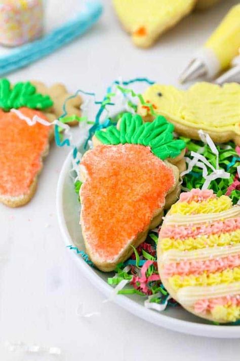 These Easter Sugar Cookies are an easy, roll-out sugar cookie decorated with vanilla buttercream. These festive Easter Cookies are so adorable! Plus, I am sharing my tips for quick and easy ways to decorate these sugar cookies! #eastercookies #eastercookiesdecorated #eastercookiesdecoratedideas #sugarcookies #eastersugarcookies Sugar Cookies With Buttercream Frosting, Cookies With Buttercream Frosting, Beyond Frosting, Roll Out Sugar Cookies, Making Sugar Cookies, Perfect Sugar Cookies, Sugar Cookie Recipe Easy, Buttercream Decorating, Easter Egg Cookies