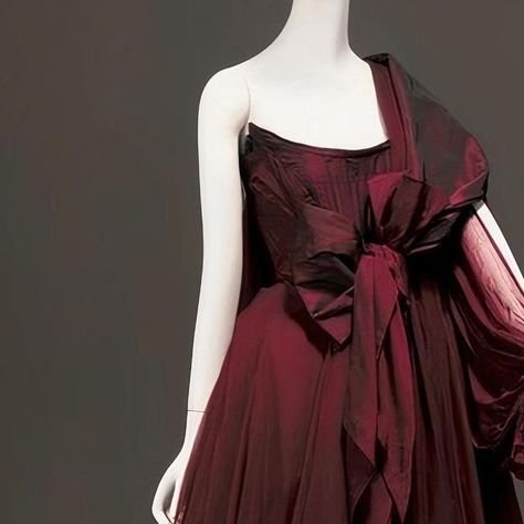 The Vivienne Westwood Archives on Instagram: "Vivienne Westwood’s gown’s at various exhibitions! 1. Gown from the A/W 1996 ‘Storm in a Teacup’ collection, on display at Museum of Fashion in Moscow. 2. & 10. Gown from the A/W 2005/2006 ‘Propaganda’ collection, on display at @metmuseum. 3. Tartan wedding gown from the A/W 1993 ‘Anglomania’ collection, on display at @nationalgalleryaus. 4. Gown from the Spring/ Summer 1994 ‘Café Society’ collection, on display at @vamuseum. 5. ‘Fragonard’ gown f Vivienne Westwood Dresses, Teacup Collection, Storm In A Teacup, Deep Red Dress, Burgundy Gown, Vivienne Westwood Dress, Famous Dress, Dresses 2013, Ethical Fashion Brands