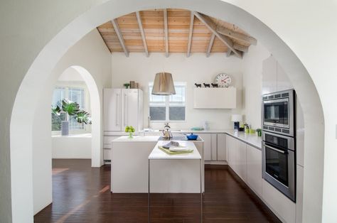 Most Stylish Kitchen designed by Global Inspirations Design  Photography: Rainbow Visions Kitchen Archway, Arch Doorways, Herringbone Tile Backsplash, Kitchen Island Tops, Cottage Style Kitchen, Kitchen New York, Blue Kitchen Cabinets, White Shaker Cabinets, Herringbone Backsplash