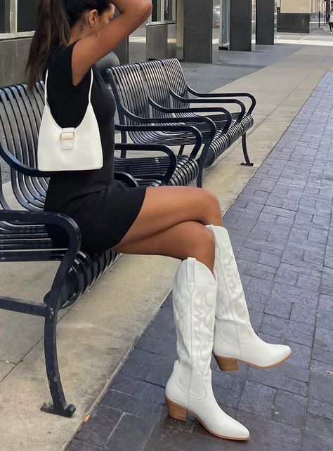 Looking for a stylish and versatile pair of boots to complete your outfit? Look no further than these white Billini cowgirl boots! Made with high-quality materials and featuring a classic Western design, these boots are perfect for adding a touch of edgy flair to any look. From casual jeans and a tee to a chic dress and jacket, these boots are sure to turn heads wherever you go. So why wait? Add these white Billini cowgirl boots to your wardrobe today and step out in style! #Billini #CowgirlBoot Stylish Boots For Women, White Cowboy Boots Outfit, Manifest 2024, Tan Leather Boots, White Cowboy Boots, Maternity Wardrobe, Elegant Boots, Luxury Boots, Boots Western