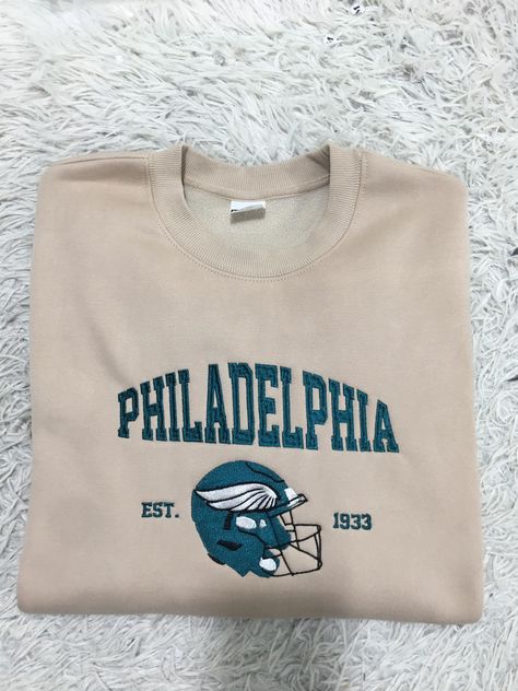 Thank you for visiting my store! ✿ Custom orders are always welcome. We can customize all the designs according to your needs! Please contact us if you have any questions. I make all custom embroidery products. If you want a unique, good quality embroidered shirt at an affordable price, come and experience it with me. Eagles Football, Gifts For Football Fans, Football Sweatshirt, Hoodie Material, Embroidered Hoodie, Football Gifts, Embroidered Tshirt, Embroidered Sweatshirts, Embroidered Shirt