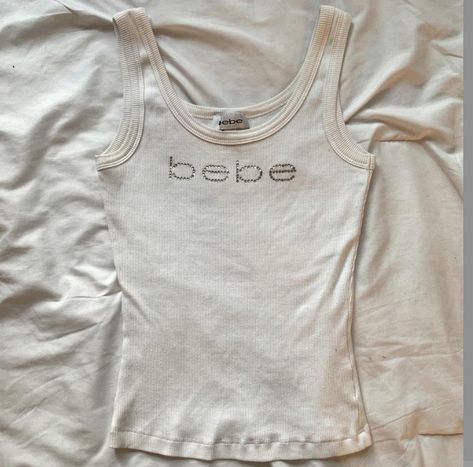 90s White Tank Top Outfit, Bebe Shirt 2000s, Bebe Clothes 2000s, White Tank Top Outfit Aesthetic, White Shirt Y2k, Bebe Shirts, Mcbling Fashion, Sick Clothes, Y2k Tank Top