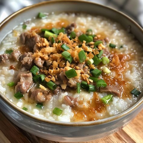 🍚 Savor the comforting taste of Goto! 🍲✨ #FilipinoCongee #Goto Goto (Filipino Congee with Tripe) Ingredients: Beef tripe, cleaned and cut into strips (500 g) Rice (1 cup) Ginger, sliced (1 tbsp) Garlic, minced (3 cloves) Onion, chopped (1) Fish sauce (2 tbsp) Beef broth (8 cups) Salt and pepper to taste Green onions, chopped (for garnish) Fried garlic (for garnish) Calamansi (for serving) Instructions: Boil beef tripe until tender, then set aside. Sauté garlic, onion, and ginger in a pot ... Filipino Congee, Rice And Fish, Boiled Beef, Beef Tripe, Fried Garlic, Instagram Recipes, Twisted Recipes, Garlic Fries, Tender Beef