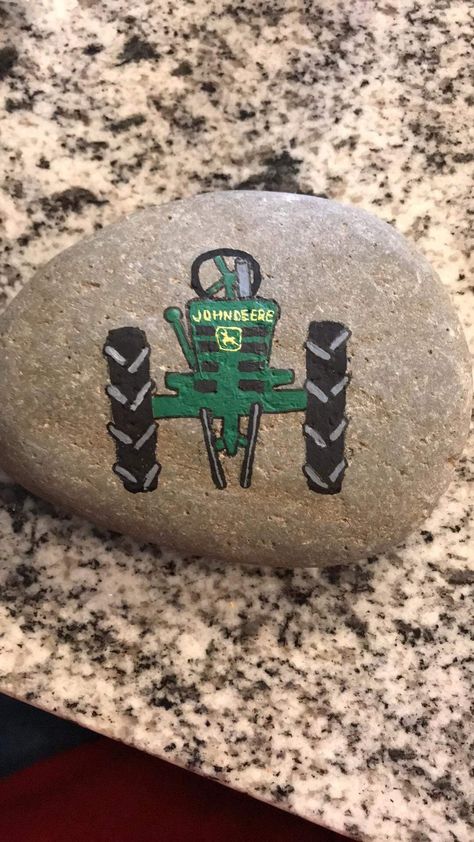 John Deere Rock by Sabrina Truck Rock Painting, Tractor Disc Ideas, Tractor Painted Rocks, Cars Painted On Rocks, Farm Painted Rocks, Tractor Painting Canvas Easy, John Deere Crafts, John Deere Art, Lane Frost