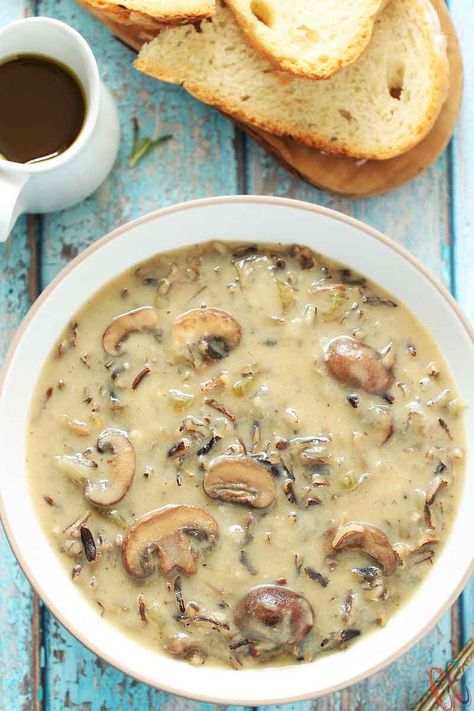 This Wild Rice Mushroom Soup is a great blend of flavors and textures, and the creaminess from the coconut milk just puts it over the top. Wild Rice Soup is the simplest soup recipe. All You need to do is just dump and cook everything in instant pot, make a roux in a separate pan and add roux once the rice and mushroom are cooked properly. That's it!! How #simple!! #mushroom #Healthy #creamy #instantpot #vegan #Easy #dairyfree #vegetarian #panera #recipes #autumn #simple #coconut Milk #best Wild Rice Mushroom Soup, Rice Mushroom Soup, Wild Rice Mushroom, Warm Soup Recipes, Wild Rice Soup Recipes, Vegan Instant Pot Recipes, Rice Soup Recipes, Mushroom Soup Recipes, Soup Vegan