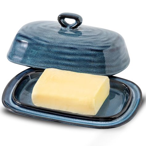 PRICES MAY VARY. Exquisite Craftsmanship: The premium butter dish is expertly crafted from high-quality porcelain, ensuring superior durability and a luxurious touch. It is lead-free and chip-resistant, guaranteeing a safe and long-lasting butter storage solution. The dish is microwave, refrigerator, and dishwasher-safe for your convenience. Perfect Size for Your Needs: With dimensions of 7.7 x 5.1 x 3.5 inches, this large butter dish provides ample space to accommodate most standard butter stic Butter Container, Butter Storage, Handle Design, Farmhouse Kitchen Decor, China Porcelain, Butter Dish, Egg Cup, Serving Dishes, Earthenware