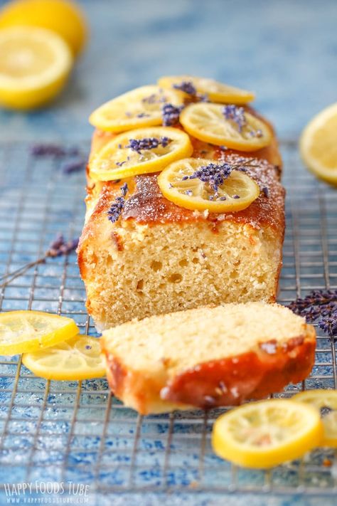 Easy Lemon Lavender Loaf Bread is perfect for everyday baking and occasions. This recipe is bursting with citrusy lemon flavor and topped with candied lemons, so easy to make from scratch! #happyfoodstube #lemon #bread #loaf #cake #recipe #baking #dessert #sweetbread Lavender Loaf Cake, Lavender Loaf, Lemon Tart Recipe, Lavender Cake, Lavender Recipes, Loaf Cake Recipes, Tea Bread, Lemon Bread, Candied Lemons