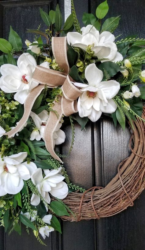 "Wreaths for Front Door, Magnolia Wreath, Spring Wreath, Summer Wreath, Farmhouse Wreath, Rustic Wreath, Everyday Wreath, Year Round Wreath, Front Door Wreath,  Magnolia wreath for front door. This wreath is the perfect mix of elegant and farmhouse to compliment your home. *The wreath features beautiful magnolias, assorted greenery and small white flower stems. It is finished off with a natural bow (natural ribbon may vary slightly depending on available supplies) .   *SIZE : Wreath is created o Wreaths For Double Front Doors Entrance, Magnolia Door Wreath, Magnolia Grapevine Wreath, Year Round Wreaths For Front Door, Magnolia Wreath Front Door, Magnolia Flower Wreath, Spring Wreaths For Front Door Diy, White Wreaths, Magnolia Wreaths