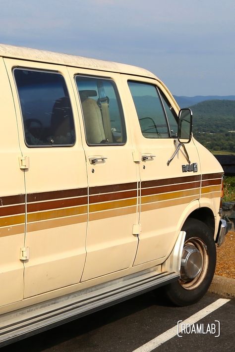 Our nomadic journy begins with Dodgy, a 1986 Dodge Ram commuter van. It is our flirtation with the much publicized #vanlife. The lessons we learn while banging around in this retro rig shapes what we want in the long run.     #roadtrip #nomads #dodge Van Outside Paint, Retro Van Stripes, Van Painting Ideas, 1970s Van, Bmw Van, 70s Van, Van Painting, Old Van, Beige Vans