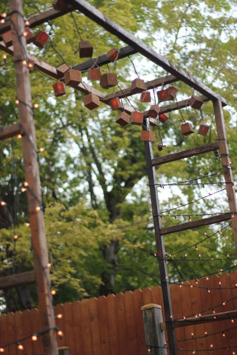 Use three vintage ladders to construct this mini pergola. It's a perfect place to hang lights or use as a backdrop for photos. Mini Pergola, Urban Balcony, Backyard String Lights, Backyard Decorating, Rustic Pergola, Building A Pergola, Easy Backyard, Wooden Pergola, Backyard Pergola