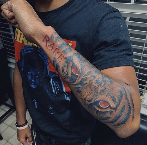 Red Tattoo Men Ideas, Red And Black Ink Tattoos Men, Red Arm Tattoo Men, Dark Skin Tattoo Men, Outer Arm Tattoo Men, Red Ink Tattoos Men, Chest Tattoo Men Ideas Black Man, Outer Arm Tattoo, Anthony Tattoo