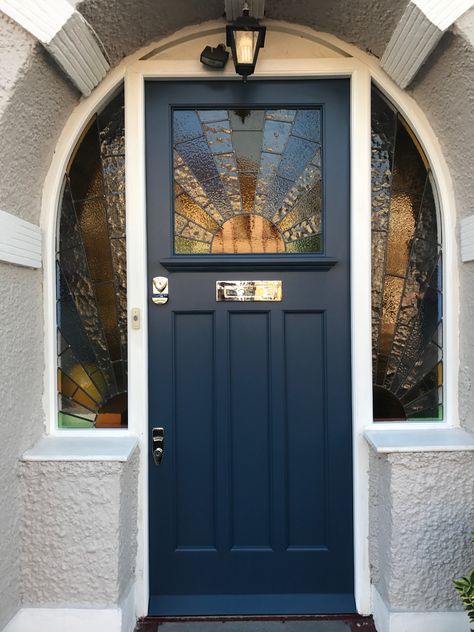 Front door with side panels