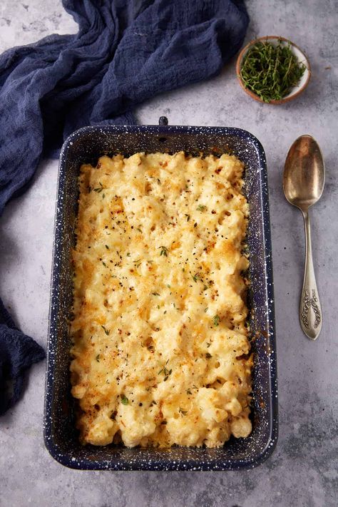 Looking for a dish that's both cheesy and veggie? Look no further than this cheesy cauliflower casserole! This dish is like a warm hug in a baking dish, with ooey-gooey cheese and tender cauliflower florets. And don't worry, it's not just delicious - it's also packed with nutrients. Cheeses Cauliflower Casserole, Cheesy Chicken Cauliflower Casserole, Cheesy Cauliflower Casserole With Everything Bagel Seasoning, Cauliflower Cheese Tipsy Housewife, Cheesy Cauliflower Casserole 12 Tomatoes, Cheesy Cauliflower Casserole, Cheesy Cauliflower Bake, Cauliflower Casserole Recipes, Cauliflower Fried