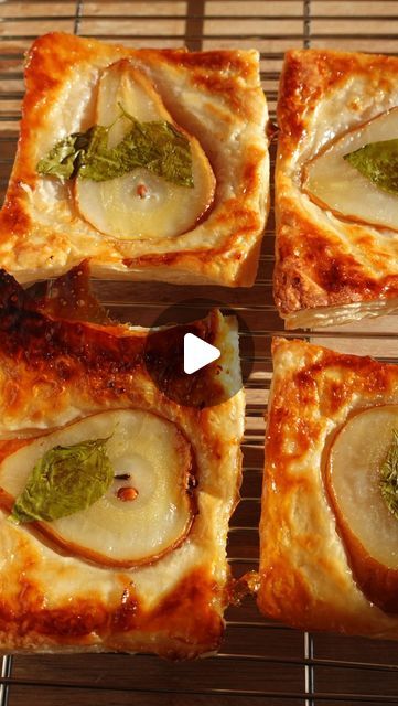 A M A N D A | travel + lifestyle on Instagram: "🥐🌿🍐 🍯 

Upside down pear tart 🍐 // i used premade pasty dough to keep it simple and just a few ingredients. these were super quick and delicious & how pretty?! 

preheat your over to 400F
roll out thawed pastry dough and divide into four sections. 
use parchment paper on your cookie sheet and squeeze a quarter size dollop of honey. sprinkle with sea salt. 
optional put a basil leaf before the sliced pear. 
the flavor is 🤌🏻
press the pastry sheet over the pear and use egg wash on top. sprinkle with coconut sugar. 
bake for about 13-15 mins until til golden brown.
let cool and transfer. 

enjoy xx 

#holidayrecipe #simplerecipe #feedfeed #peartart #easyrecipes #pastries #yummyyummy" Lemon Posset Recipe, Posset Recipe, Dirt Cheap Meals, Summer Pasta Recipes, Pear Tart, Puff Pastries, Basil Leaf, Pastry Sheets, Puff Pastry Recipes