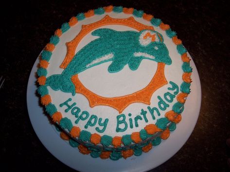 Miami Dolphins cake - Made for my husbands 32nd birthday. He said and I quote, " Only I would want a cake of the worst football team in the NFL." Hey, you gotta remain loyal!?! Miami Dolphins Cake, Dolphins Cake, Dolphin Birthday Cakes, Nfl Cake, Dolphin Birthday Parties, Dolphin Birthday, Dolphin Cakes, Dolphin Party, 32nd Birthday