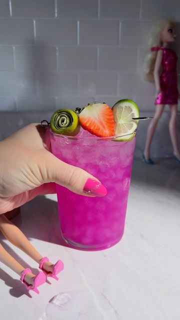 Moody Mixologist / Amy Traynor on Instagram: "Barbie Margarita 2 oz pink tequila @calirosa 1 oz lime juice 1 oz dragonfruit simple syrup When life gives you a house full of Barbies, let your kids choose your nail color and make a matching Margarita. #tequila #cocktails #barbie #cocktailtime #cocktailrecipe #drinkstagram #mommyneedsadrink #margarita #pinktequila #drinkstagram #dragonfruit #saturdayvibes" Barbie Margarita Recipe, Pink Tequila Cocktail, Barbie Margarita, Barbie Cocktail Drink, Margherita Drink, Dragonfruit Margarita, Dragonfruit Cocktail, Fruit Simple Syrup, Pink Tequila