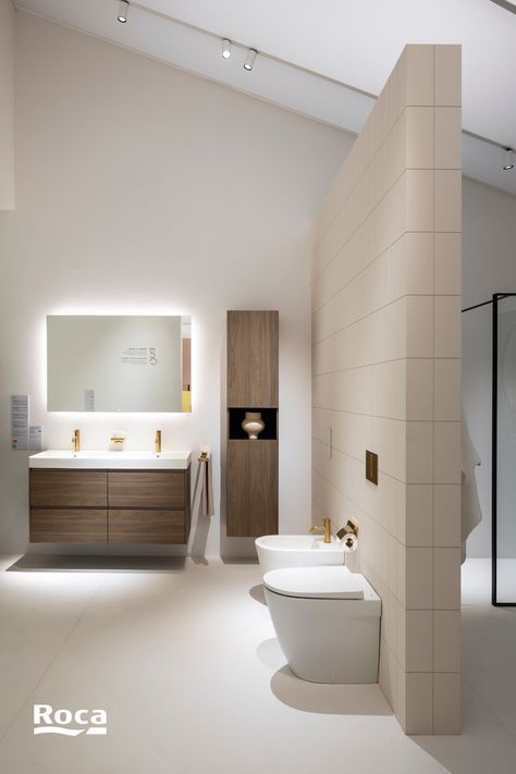 Transform your bathroom with the sleek, minimalist design of the Ona Collection. The clean lines and white fixtures create a serene, Mediterranean-inspired space, perfect for modern sophistication. Add subtle greenery and natural elements to enhance the calm and beauty. Discover the perfect blend of style and function with the Ona Collection.

#MinimalistBathroom #MediterraneanDesign #RocaOna #ModernBathroom #BathroomInspo" Bathroom Exhibition, Mediterranean Minimalism, Space Saving Toilet, Mediterranean Living, Corner Bath, Latest Bathroom, Temporary Structures, Mediterranean Landscaping, Mediterranean Design