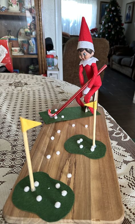 Elf on the shelf playing golf Elf On Shelf Golf, Elf On The Shelf Golf Ideas, Golf Elf On The Shelf, Elf On The Shelf Golf, Elf Fun, Playing Golf, Elf Ideas, Shelf Ideas, On The Shelf