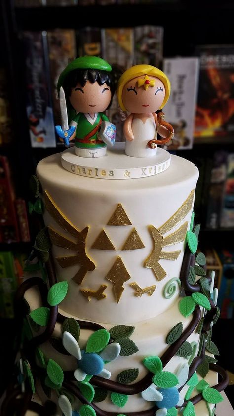 The top of our wedding cake. Cake credit to Cakes Rock! In Austin, TX. Topper from tinylittlegeeks on Etsy. Zelda Wedding Cake, Zelda Themed Wedding, Legend Of Zelda Wedding, Wedding Cake Cake, Zelda Wedding, Gamer Wedding, Wedding Theme Ideas, Wedding Dress Trends, Cake Cake