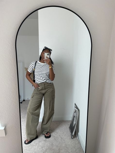 Striped tee, khaki cargos, minimal, casual Elevated Airport Outfits, Stripe Tee Outfit, Trending Fits, Cargos Outfit, Oversized Cargo Pants, Cargo Outfit, Airport Outfits, Airport Fits, Fashionably Late