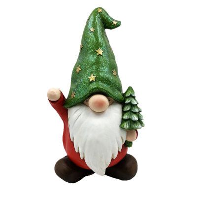 Who needs elves when you can have Christmas Gnomes?! "The good fellows" are a collection of six assorted gnome garden statues, each wearing Christmas garments and hats and engaged in holiday activities like opening presents. Crafted from durable magnesium, each gnome is hand painted with special attention to details, patterns, and textures. They all have classic white beards and oversized pointy hats, looking especially cute with their large round nose and eyes covered. | The Holiday Aisle® Gard Gourd Christmas Gnomes, Christmas Knomes, Clay Gnomes, Gnome Ceramic, Hoop Crafts, Star Hat, Eyes Covered, Opening Presents, Holiday Gnomes