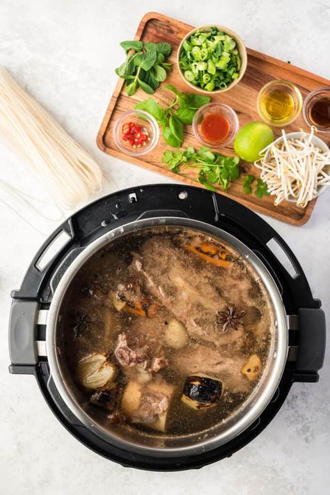 This Instant Pot Pho is my version of a the classic Vietnamese noodle soup. It’s made with homemade beef broth, tender beef, fresh herbs, and more. Just 10 minutes to prep! Bone Broth Pho, Instant Pot Pho Recipe, Instant Pot Pho, Homemade Beef Broth, Vietnamese Noodle Soup, Pho Broth, Pho Recipe, Handle The Heat, Beef Bone Broth