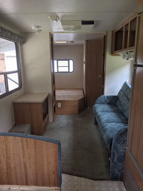 2000 Coachmen Catalina Travel Trailer Renovation Travel Trailer Renovation, Trailer Renovation, Travel Trailer Living, Small Table And Chairs, Rv Interior Remodel, Fireplace Console, Removing Carpet, Build A Fireplace, Hidden Tv