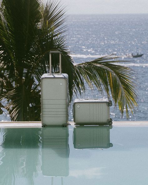 Sitting poolside, light dances across the metallic surface of our Silver Hybrid Carry-On and Hybrid Trunk. Photographed by @katherinemoff.at  #Monos #JourneyOn #MonosTravel #HybridCarryOn #HybridTrunk #HybridCollection #CarryOn #CarryOnLuggage #Travel #Traveller #TravelCompanion #TravelLover #TravelTheWorld #Suitcase #Luggage #PackYourBags #Design #IntentionalDesign #Silver July Luggage, Premium Luggage, Carryon Luggage, Annual Sale, Semi Annual Sale, Summer Getaway, Pack Your Bags, Travel Set, Luggage Sets